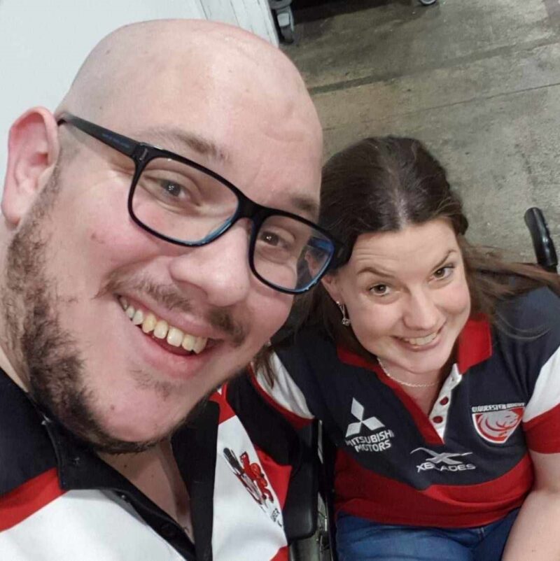 Emily Hoddy with her husband James. They are both wearing Gloucester Rugby shirts